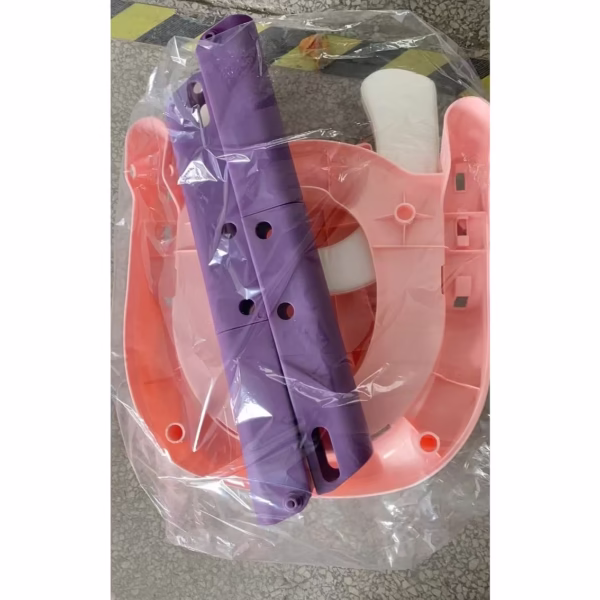 Reductor si Scaunel Inaltator WC, Flippy, pentru Copii 1 - 7 Ani, 2 Trepte Reglabile, Pliabil, Colac Moale, cu Spatar si Manere, Inaltime 54/58 cm x 39.5 x 35 cm, din Plastic+PVC, Roz/Mov - imagine 7