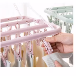 Uscator de rufe Flippy, 32 de cleme, Plastic, Pliabil, rotire 360 grade, 32x32 cm, Roz - imagine 4