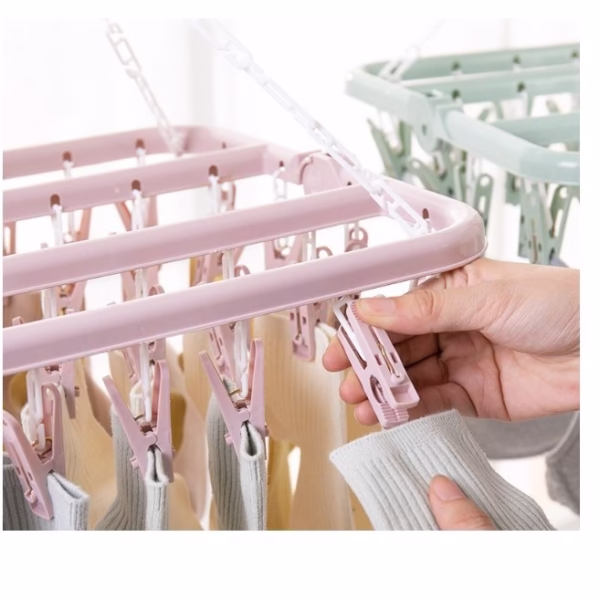 Uscator de rufe Flippy, 32 de cleme, Plastic, Pliabil, rotire 360 grade, 32x32 cm, Roz - imagine 4